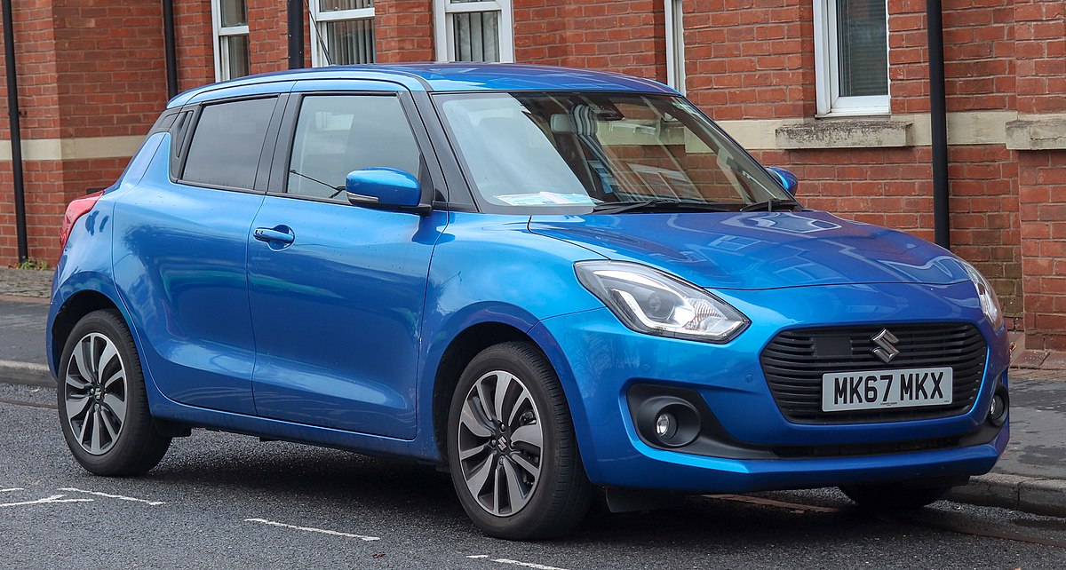 1200px-2018_Suzuki_Swift_SZ5_Boosterjet_SHVS_1.0_Front.jpg