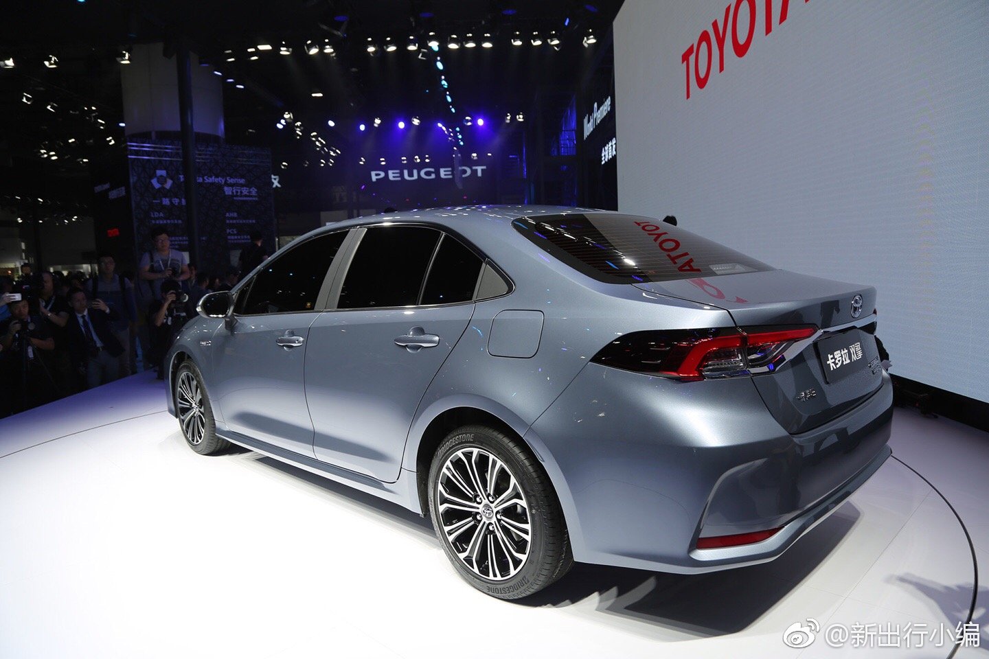 2020-toyota-corolla-hybrid-sedan-rear-three-quarte-6b87.jpg