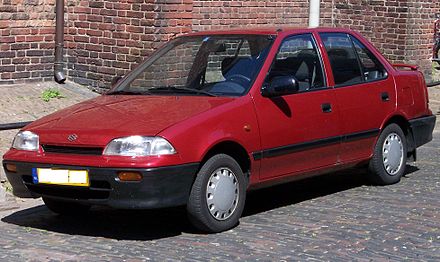 440px-Suzuki_Swift_4door_red_vl.jpg